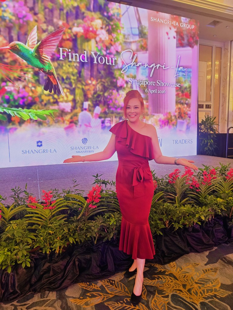 Sylvia Tham hosting corporate awards ceremony as professional emcee in Singapore